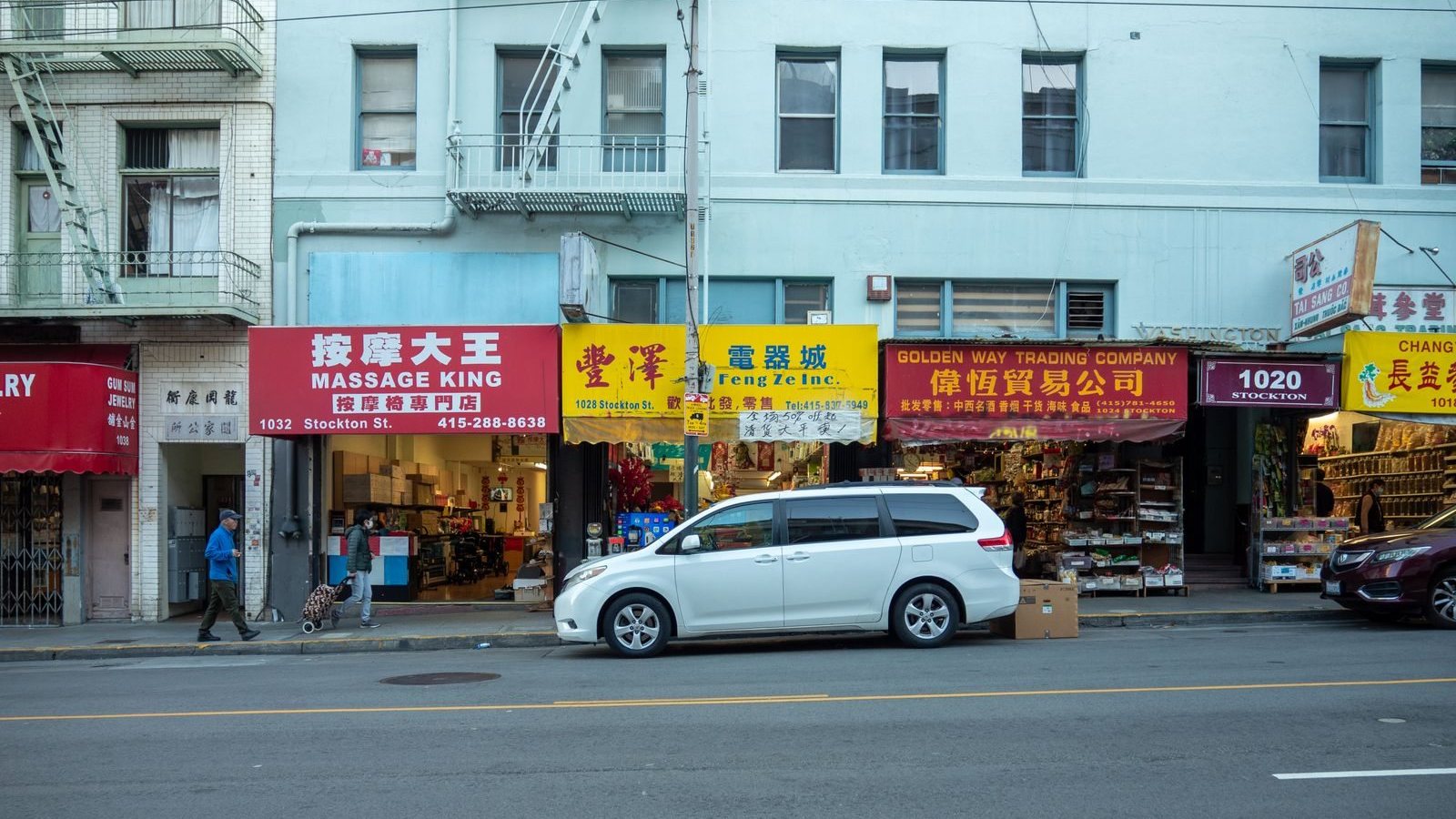 Shops and pedestrians in Chinatown in San Francisco, California.